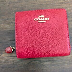 Coach Snap Wallet in Red with a strawberry drop